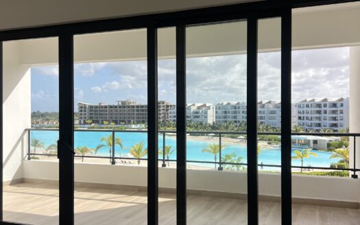 Live in the Heart of Punta Cana: Apartment with Stunning Crystal Lagoon View at The Beach City Place